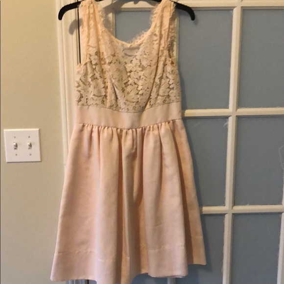 Adorable mini dress in a light peach color - Picture 1 of 3